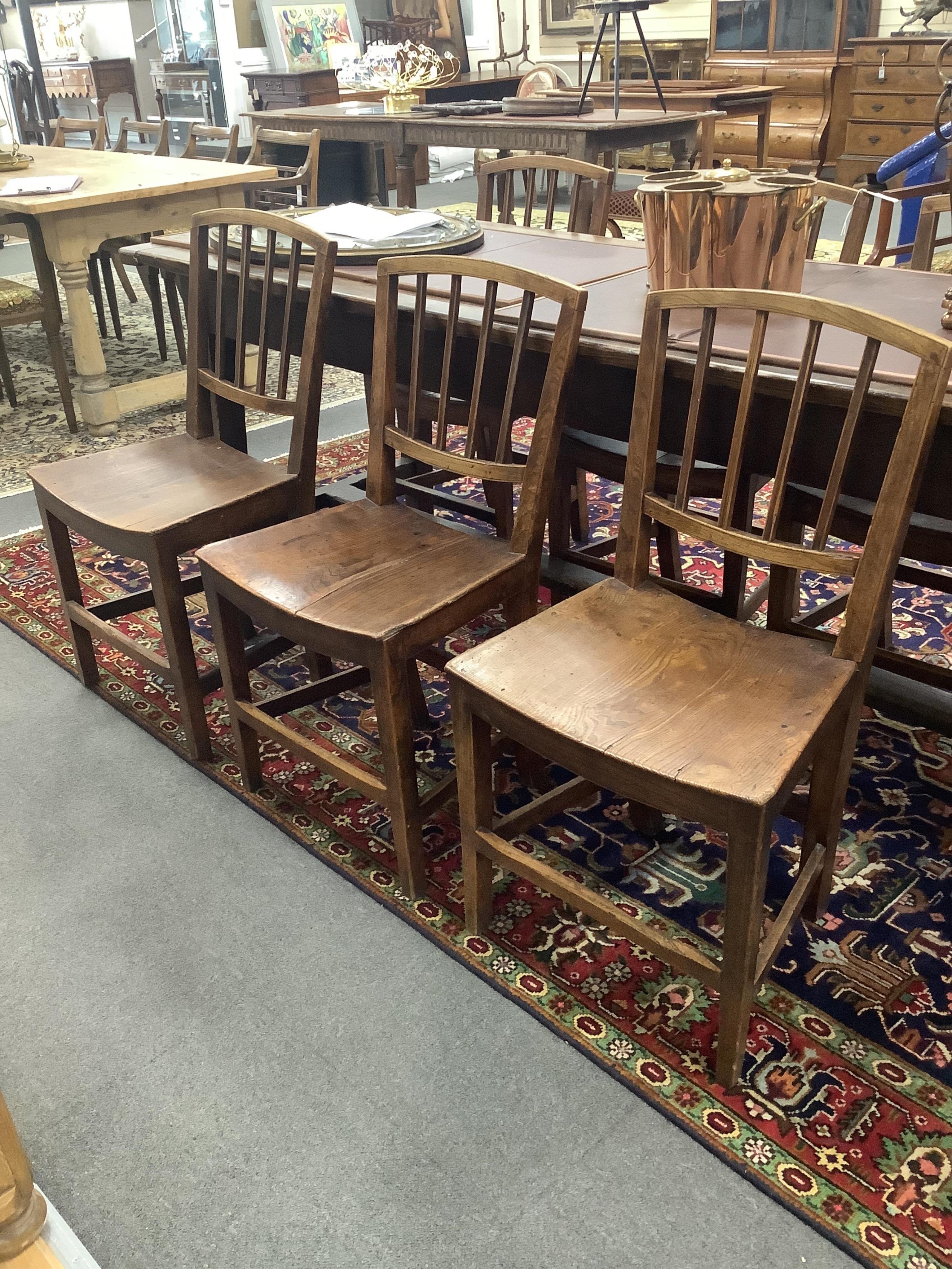 A set of six George III Provincial elm wood seat dining chairs. Condition - fair